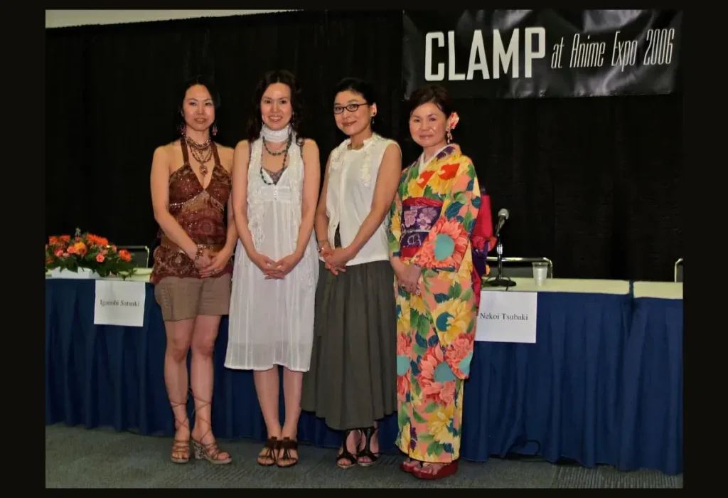 Mulheres Mangakas: A Revolução Silenciosa que Moldou o Mangá Moderno 19 As quatro mangakas mulheres que formam o lendário coletivo CLAMP. O grupo é responsável por criar universos interligados em obras como Sakura Card Captors e Guerreiras Mágicas de Rayearth.
